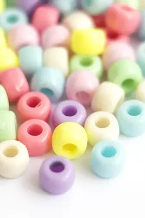 Commande En Gros 100 perles en plastiques pour enfants - Pastel - 9x6 mm