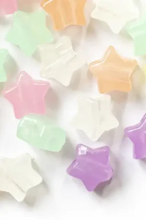 Prix Choc 50 perles en plastique - étoiles - phosphorescent / brille dans le noir