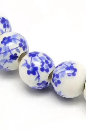 Solde Lot de 10 perles en porcelaine - Fleurs bleues - 6 mm