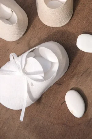 Remise Chausson de bébé a dragees Blanc X 4 pièces