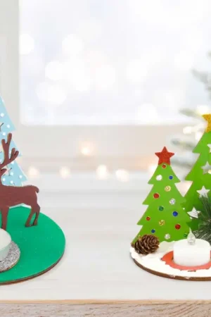 Assortiment 2 bougeoirs avec scène de Noël Offre Limitée